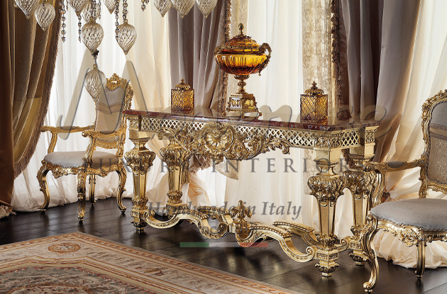 Luxury and elegant crystal accessory on a full gold leaf Modenese Interiors console with Red France marble top