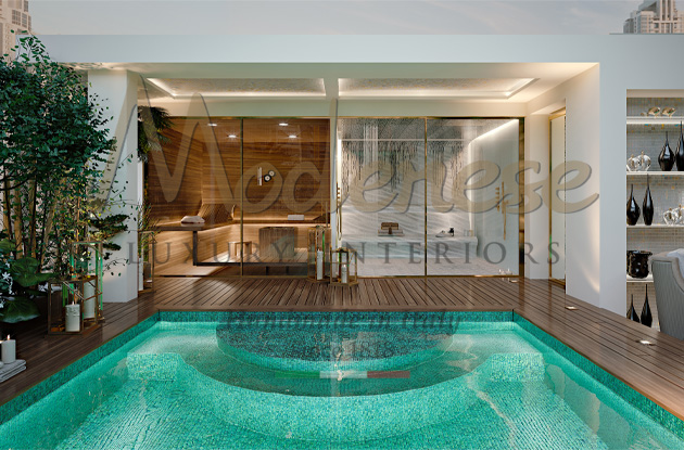 Elegant swimming pool design with plants and luxury wooden sauna by Modenese