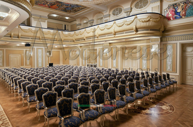 Conference room with Modenese’s classic blue upholstered chairs