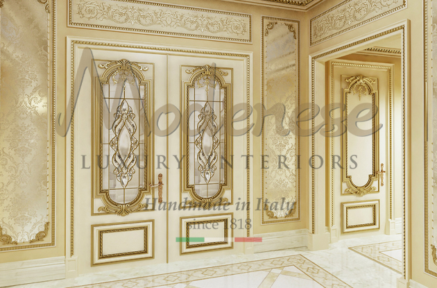 Ivory and gold leaf details and decorations doors and walls Modenese interior design custom made