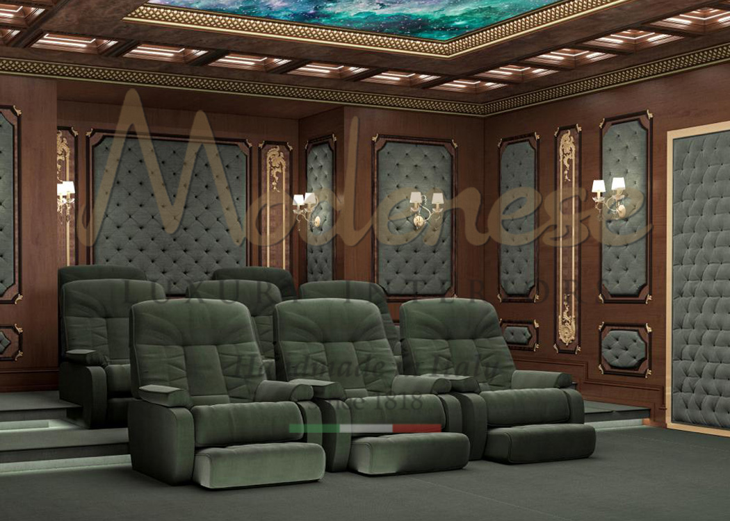 Green fabric armchairs that match the upholstered walls in this Modenese walnut home cinema