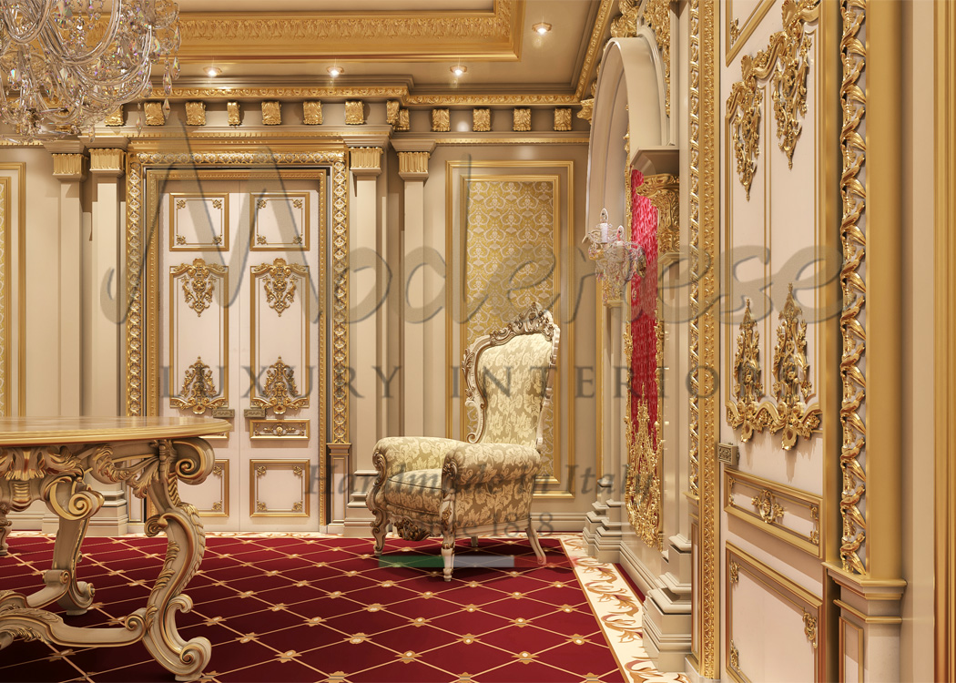 Gold leaf and cream patterned fabric throne with red floors and hand carved wall decorations by Modenese