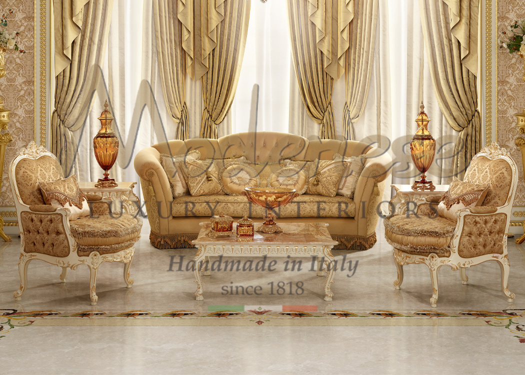 Beige fabric and gold leaf details armchairs and sofas with luxury accessories in Modenese interior design projects