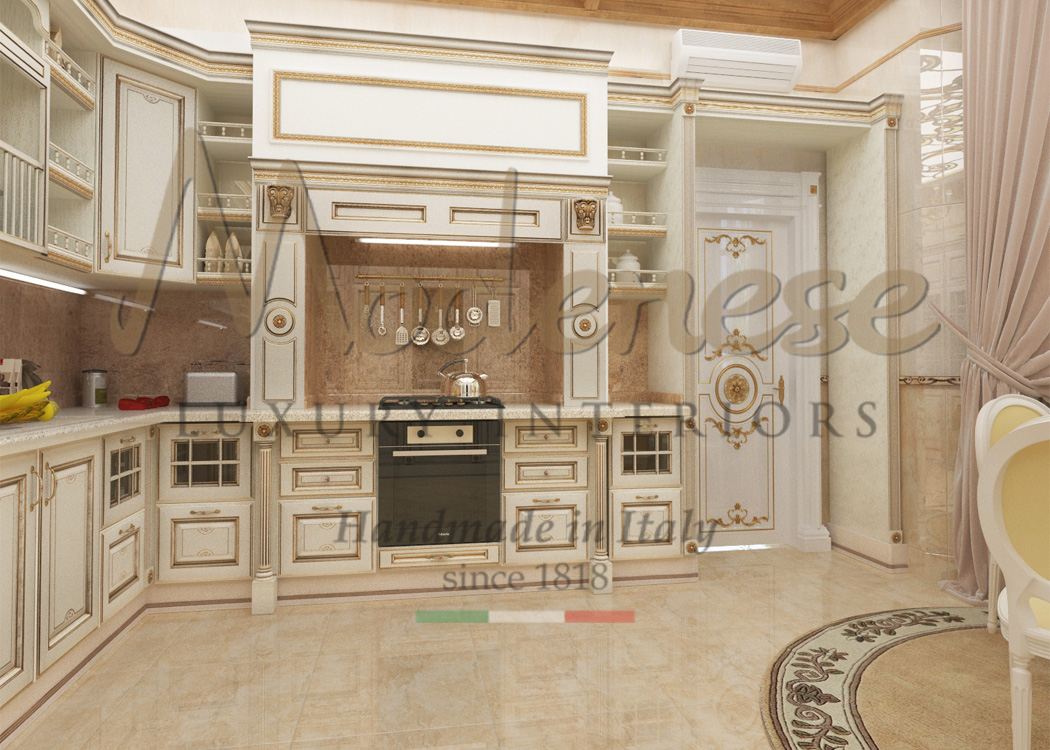 Modenese classic ivory kitchen with gold leaf details and decorations