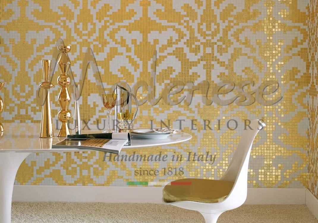 Gold and white mosaic tiles for wall decoration white chair with gold fabric and white table with golden accessories Modenese interior design projects