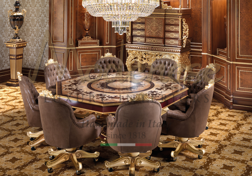 Octagonal inlaid wooden top table and 8 brown leather swivel armchairs with gold leaf details Modenese