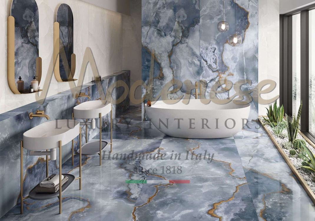 Blue marble with gold details tiles for contemporary bathroom and white ceramic furniture with metallic gold elements Modenese interiors