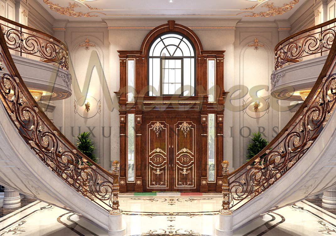 Modenese luxury entry doors with windows and gold leaf decoration matching handrails on stairs interior design