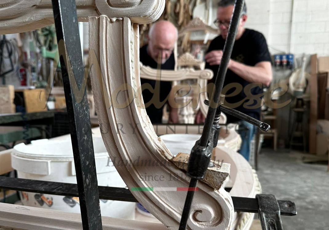 Modenese hand carved wood detail and carpenters working on products